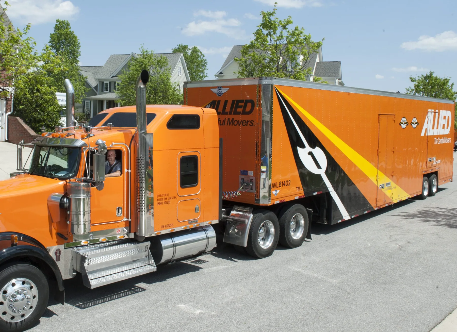 Allied Van Lines moving truck operated by Allegheny Valley Transfer parked in a Pittsburgh neighborhood