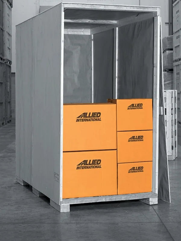 Sealed wooden storage vault holding Allied moving cartons inside the Allegheny Valley Transfer warehouse